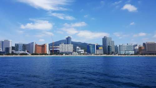 Skyline of Busan across the water in South Korea free photo