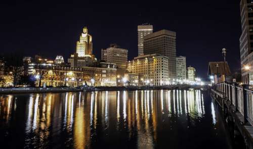 Skyline of Providence, Rhode Island at nighttime over the water free photo