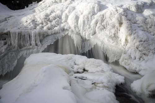 Smooth Cascading Lower Falls in the winter at Gooseberry Falls State Park, Minnesota free photo