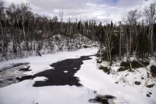 Snowy landscape of the Temperance River in Temperance River State Park, Minnesota free photo