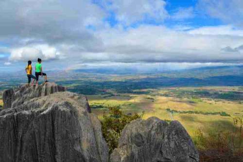 Standing on Mount Capistrano looking out at the landscape in the Philippines free photo
