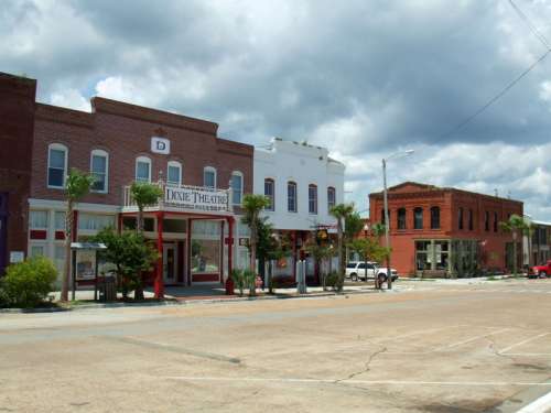 Street in Apalachicola showing the Dixie Theatre in Apalachicola, Florida free photo