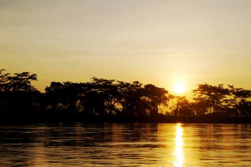 Sunset over the Magdalena River in Colombia free photo