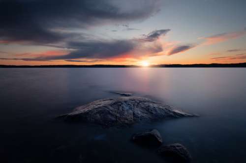 Sunset over the water in Artipelag, Värmdö, Sweden free photo