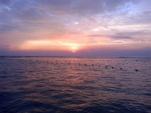 Sunset over the waters in Sri Lanka free photo