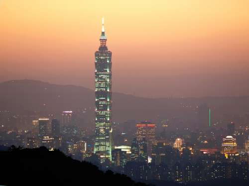 Taipei 101 with lights at dusk in Taiwan free photo