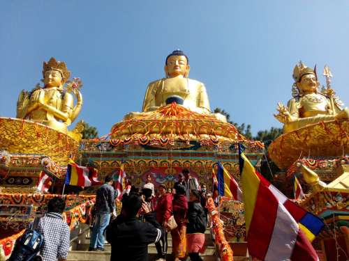 Three Buddha Statues in the Temple in Kathmandu, Nepal free photo
