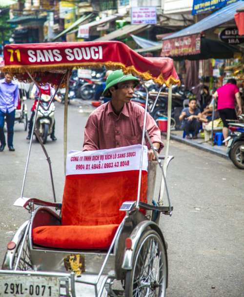 Traditional cyclo in Hanoi, Vietnam free photo
