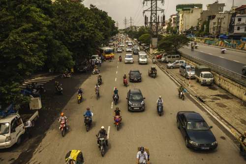 Traffic in the roads of Hanoi, Vietnam free photo