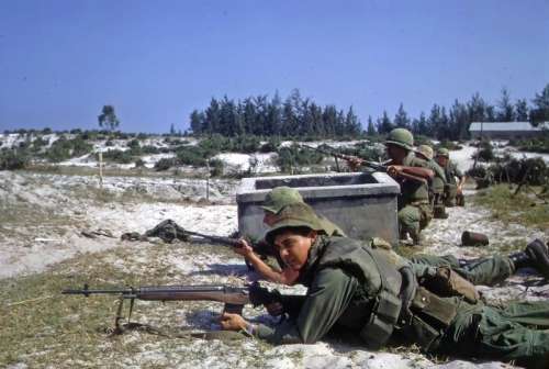 U.S. Marines with M14 rifles battle in Hamo village in Vietnam War free photo