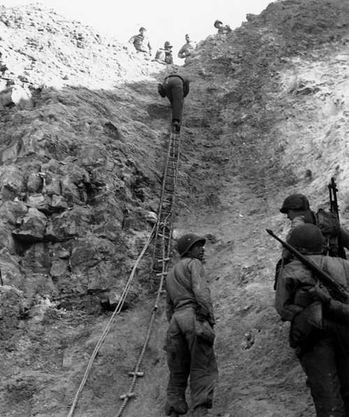 U.S. Rangers scaling the wall at Pointe du Hoc , Normandy, World War II free photo