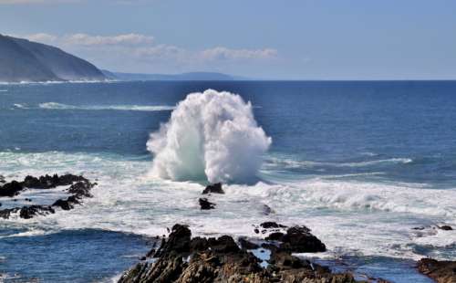 Waves and surf in ocean landscape in South Africa free photo