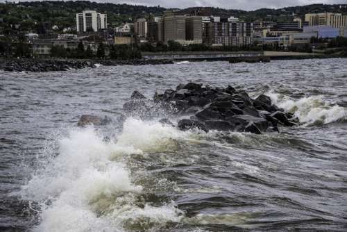 Waves crashing over Rocks in Lake Superior in Duluth, Minnesota free photo