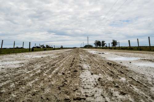 dirt road in the field after a rain free image