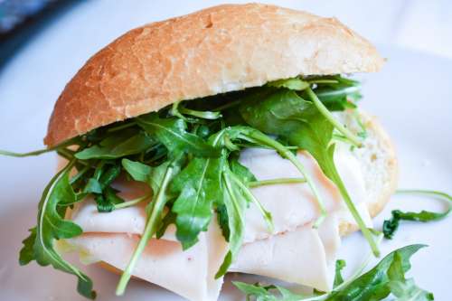 Fresh homemade baguette with rucola