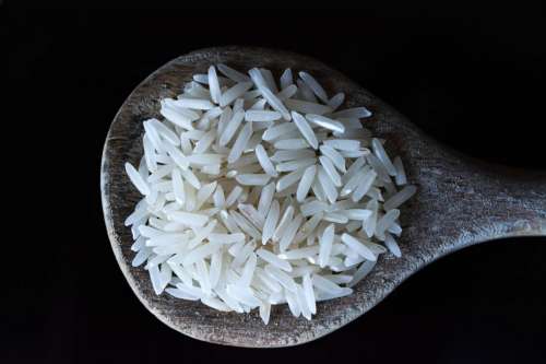 Rice on wood spoon