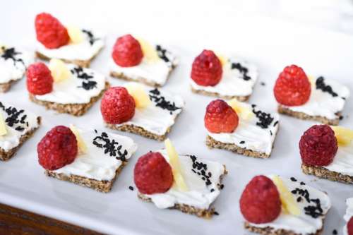 Small savours with fit bread and raspberries