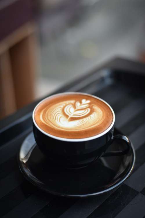 Artistic prepared cappuccino at café
