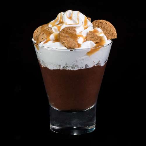 Hot chocolate with whipped cream and cookies
