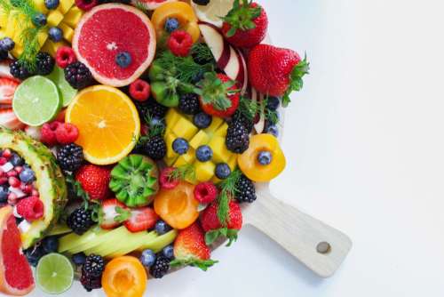 Mix of fruit on a wooden board