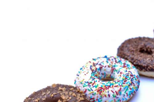 Three donuts on white background