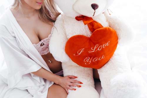 Happy Woman with Big Teddy Bear on Valentine’s Day