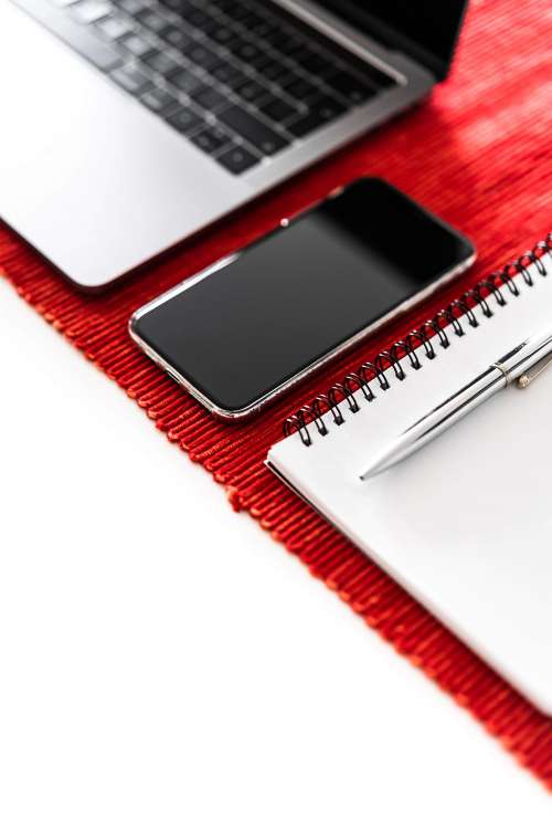 Office Essentials: Smartphone, Laptop and Diary