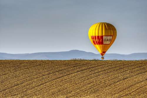 Balloon Hot Air Balloon Field Landscape Blue Sky