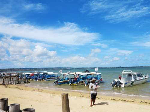 Beach Speed Boat Bali Blue Sky And White Clouds