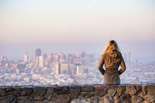 Blonde Sitting Wall Buildings City Cityscape