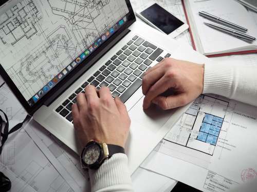 Blueprints Entrepreneur Hands Laptop Macbook