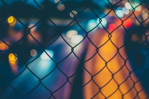 Blurred Bokeh Fence Lights Wire Mesh