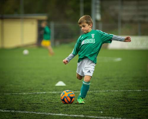 Child Soccer Playing Kick Footballer Ball