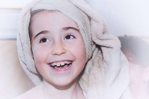Child Girl Face Towel Laugh Portrait Close Up