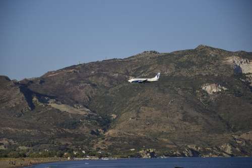 Coast Aircraft Mountains Flight Landing Sea