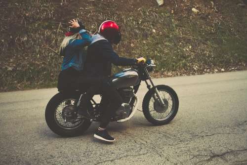 Couple Driving Motorcycle Young Travel Lifestyle