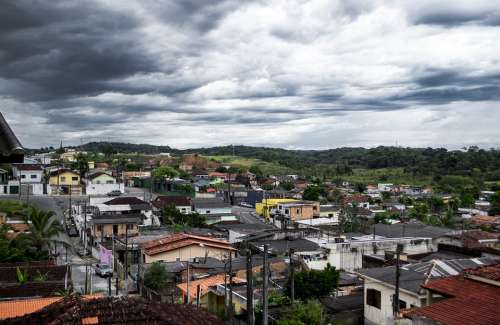 Favela City Storm Between Clouds