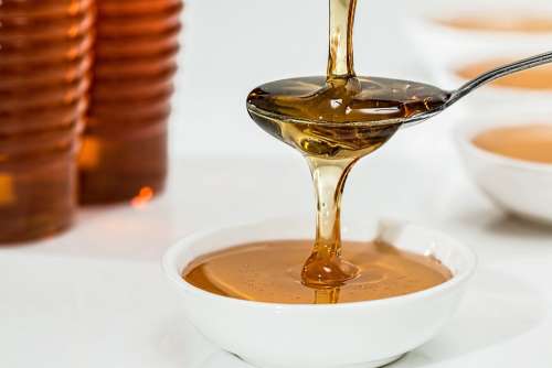 Honey Sweet Syrup Organic Golden Teaspoon Pouring