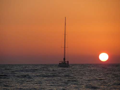 Sea Sunset Sun Sky Boat Clouds Water Beach