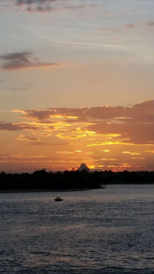 Sunset With Boat Sunset Over Water