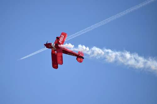 The Plane Biplane Stunts Streaks Sky