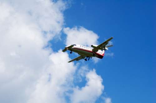The Plane Sky Flight Airfare Clouds Wings Landing