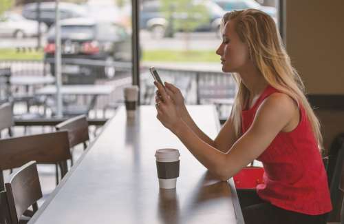 Woman Sitting Counter Phone Smartphone Female