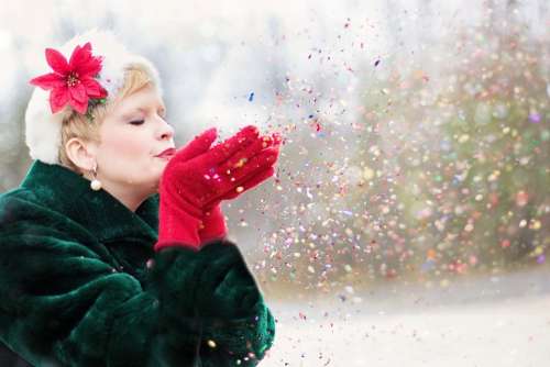 Young Woman Blowing Glitter Xmas Seasonal Winter