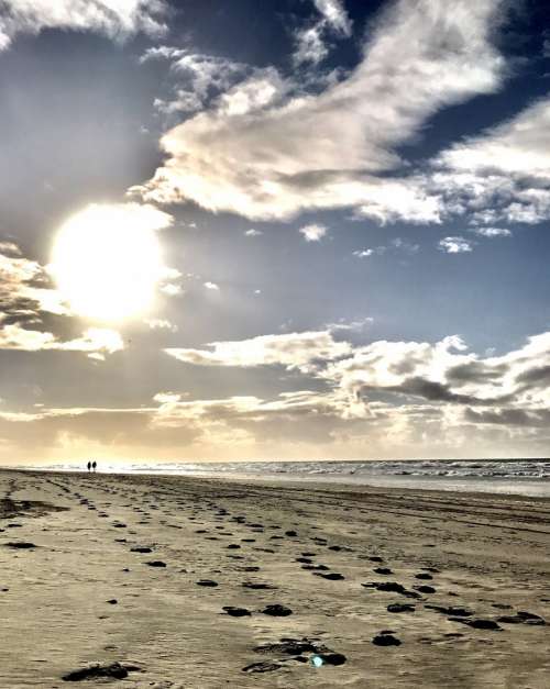 People walking at the beach of Ameland | The Netherlands