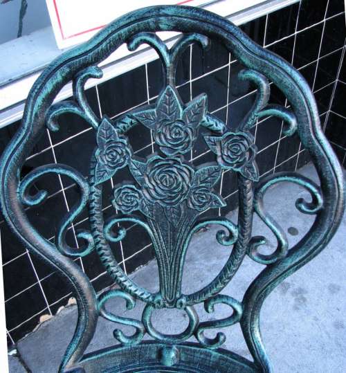 chair back with rose bouquet