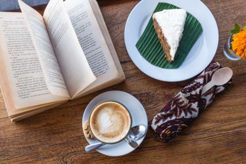Relaxing with coffee, cake and book