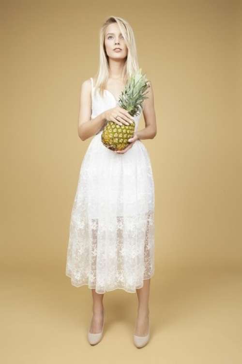 Beautiful Bride Holding A Pineapple