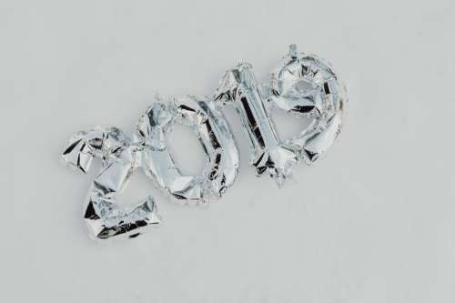 Silver balloons in shape of New Year of 2019