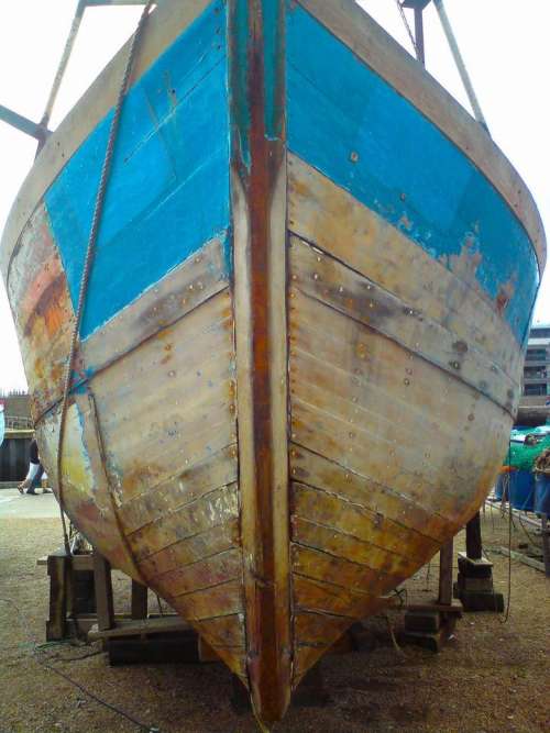 Boat hull wooden blue moored